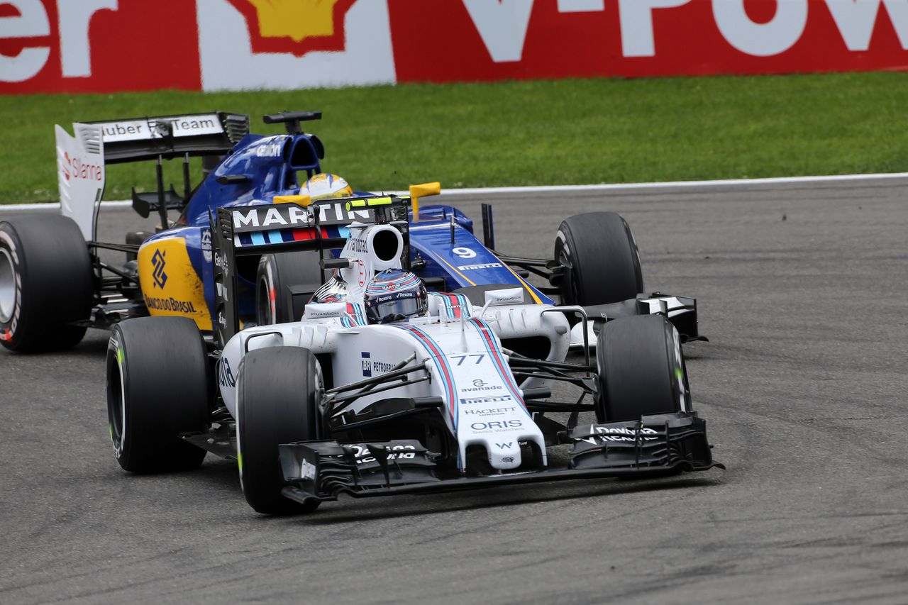 GP BELGIO, 23.08.2015 - Gara, Valtteri Bottas (FIN) Williams F1 Team FW37 e Marcus Ericsson (SUE) Sauber C34