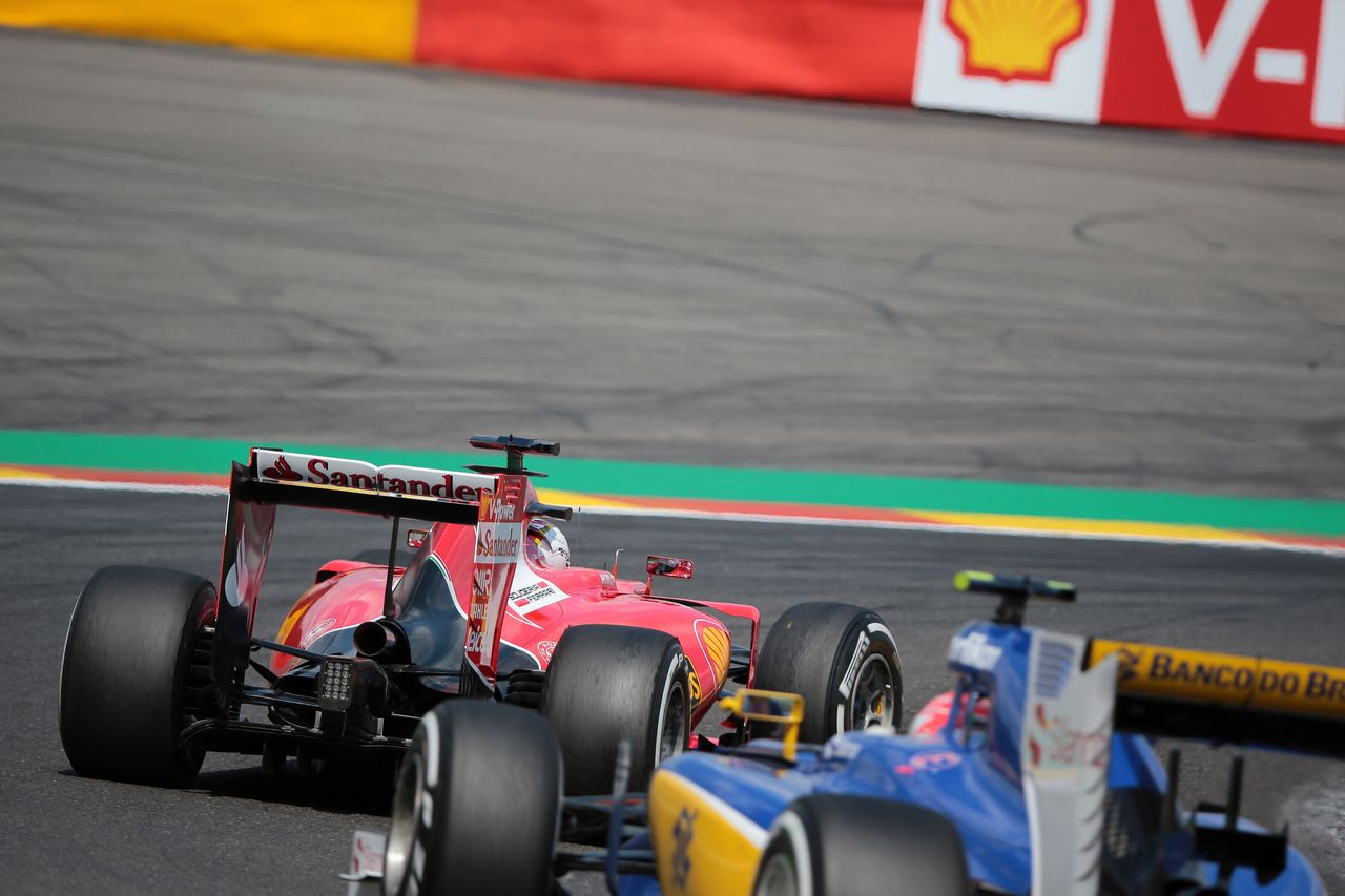 GP BELGIO, 21.08.2015 - Prove Libere 2, Sebastian Vettel (GER) Ferrari SF15-T e Felipe Nasr (BRA) Sauber C34