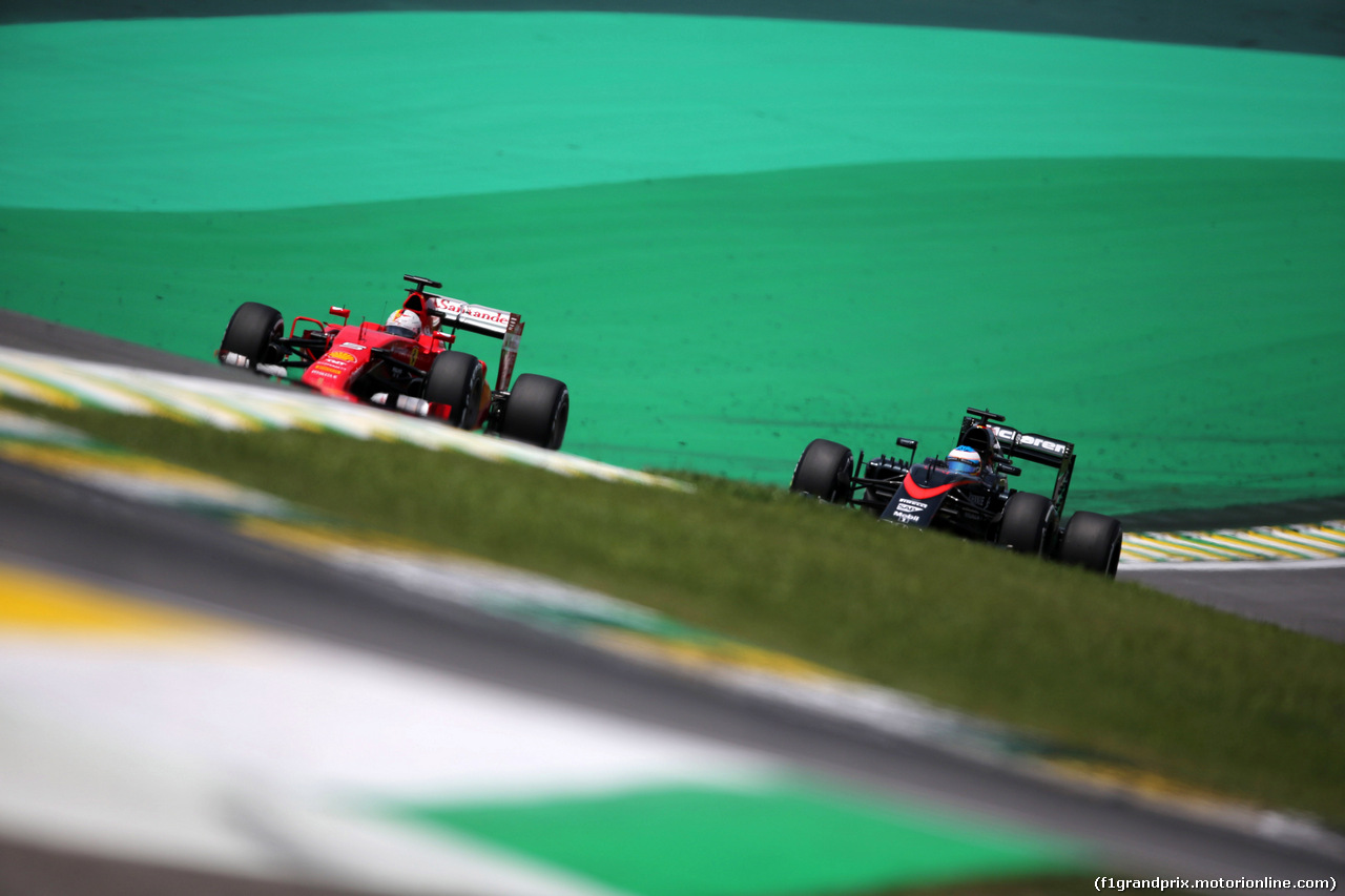 GP BRASILE, 14.11.2015 - Prove Libere 3, Sebastian Vettel (GER) Ferrari SF15-T e Fernando Alonso (ESP) McLaren Honda MP4-30