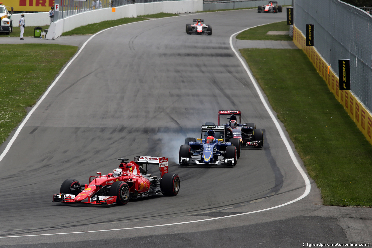 GP CANADA, 07.06.2015 - Gara, Sebastian Vettel (GER) Ferrari SF15-T davanti a Felipe Nasr (BRA) Sauber C34