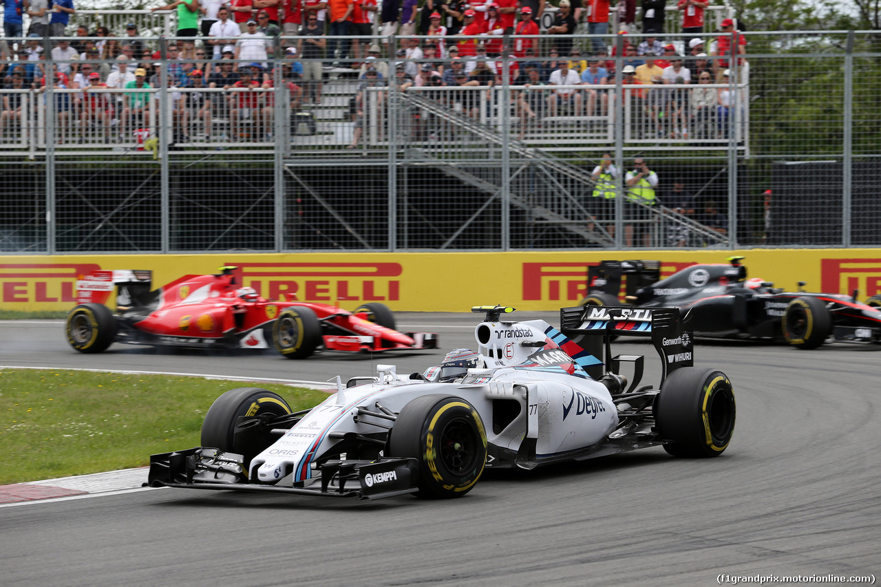 GP CANADA, 07.06.2015 - Gara, Valtteri Bottas (FIN) Williams F1 Team FW37 davanti a Jenson Button (GBR)  McLaren Honda MP4-30. e Kimi Raikkonen (FIN) Ferrari SF15-T