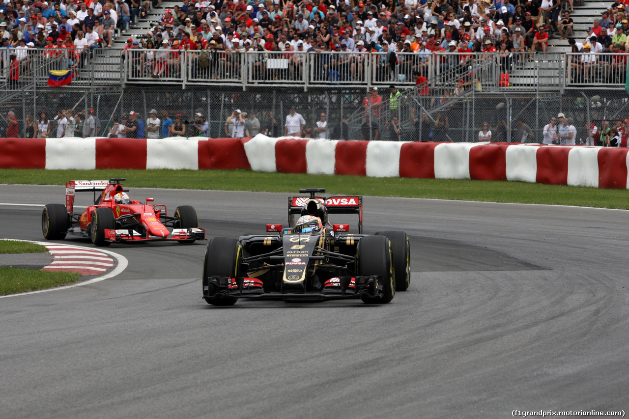 GP CANADA, 07.06.2015 - Gara, Romain Grosjean (FRA) Lotus F1 Team E23 davanti a Sebastian Vettel (GER) Ferrari SF15-T