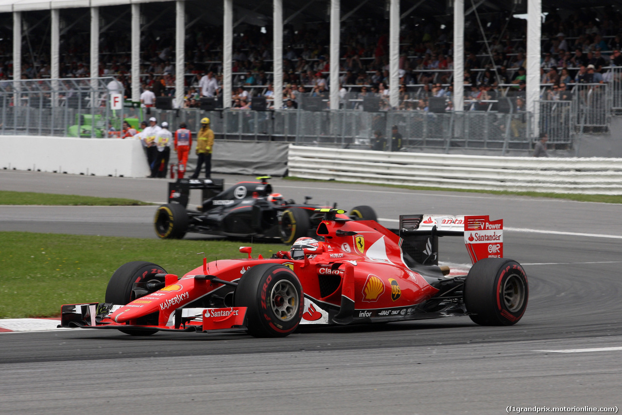 GP CANADA, 07.06.2015 - Gara, Kimi Raikkonen (FIN) Ferrari SF15-T davanti a Jenson Button (GBR)  McLaren Honda MP4-30.