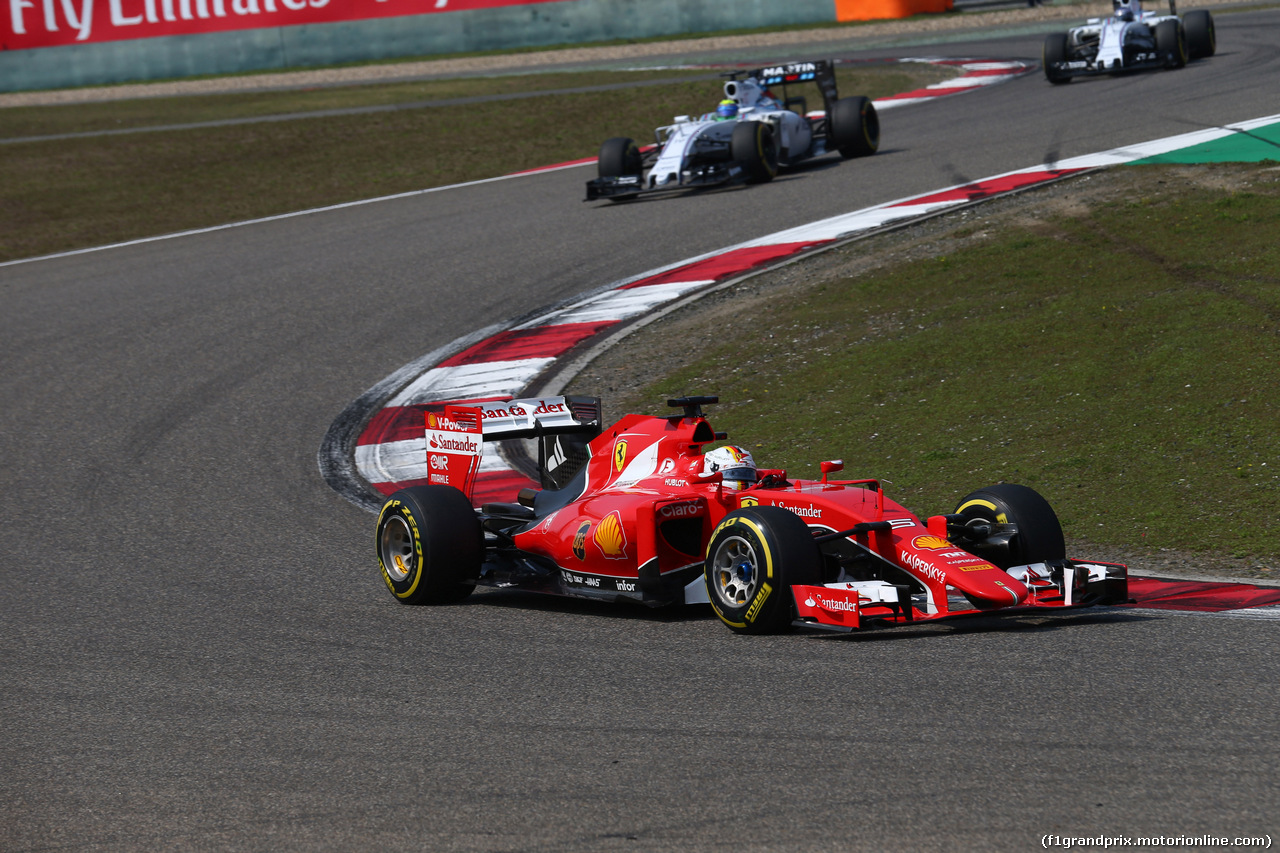 GP CINA, 12.04.2015 - Gara, Sebastian Vettel (GER) Ferrari SF15-T davanti a Felipe Massa (BRA) Williams F1 Team FW37