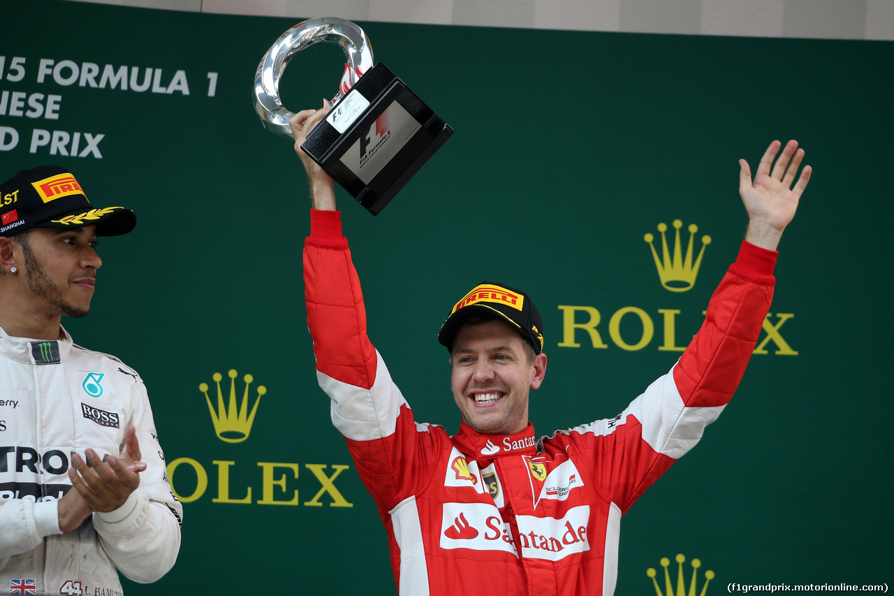 GP CINA, 12.04.2015 - Gara, terzo Sebastian Vettel (GER) Ferrari SF15-T e Lewis Hamilton (GBR) Mercedes AMG F1 W06 vincitore