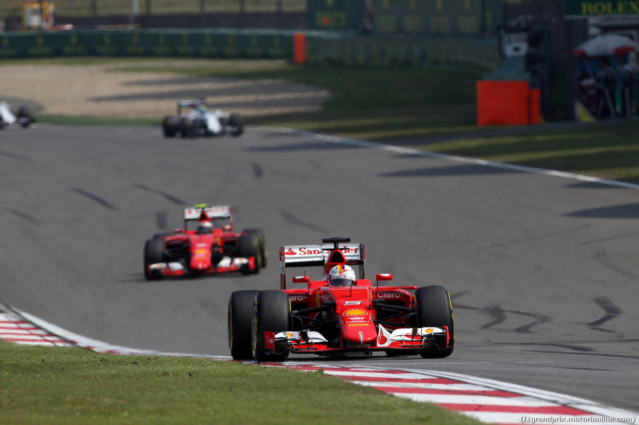 GP CINA, 12.04.2015 - Gara, Sebastian Vettel (GER) Ferrari SF15-T davanti a Kimi Raikkonen (FIN) Ferrari SF15-T