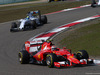 GP CINA, 12.04.2015 - Gara, Kimi Raikkonen (FIN) Ferrari SF15-T davanti a Felipe Massa (BRA) Williams F1 Team FW37