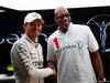 GP CINA, 11.04.2015 - (L to R): Nico Rosberg (GER) Mercedes AMG F1 with Ed Moses (USA) 400m Hurdles Athletics Legend.