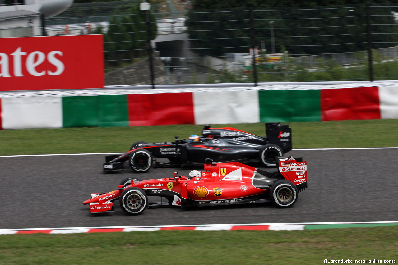 GP GIAPPONE, 26.09.2015 - Prove Libere 3, Sebastian Vettel (GER) Ferrari SF15-T e Fernando Alonso (ESP) McLaren Honda MP4-30