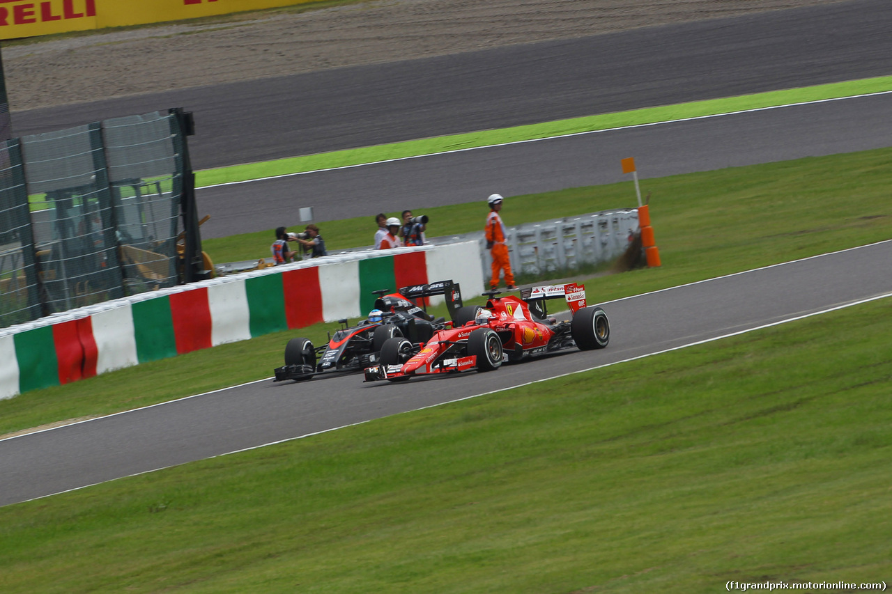 GP GIAPPONE, 26.09.2015 - Prove Libere 3, Sebastian Vettel (GER) Ferrari SF15-T e Fernando Alonso (ESP) McLaren Honda MP4-30