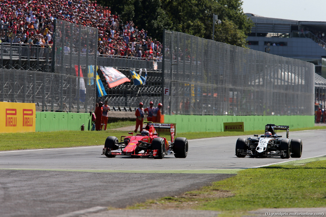 GP ITALIA, 06.09.2015 - Gara, Kimi Raikkonen (FIN) Ferrari SF15-T e Nico Hulkenberg (GER) Sahara Force India F1 VJM08