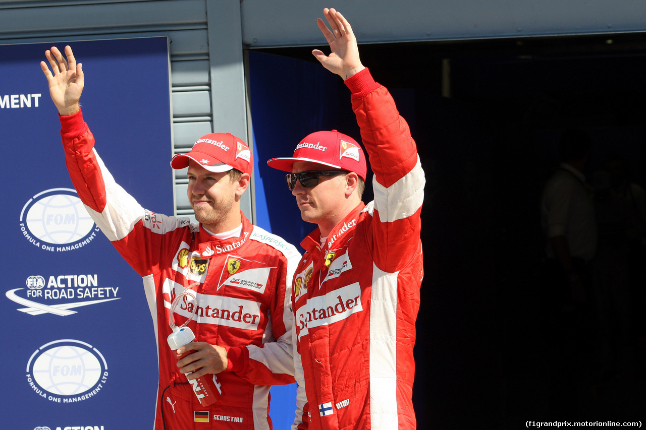 GP ITALIA, 05.09.2015 - Qualifiche, Sebastian Vettel (GER) Red Bull Racing RB10 e Kimi Raikkonen (FIN) Ferrari F14-T