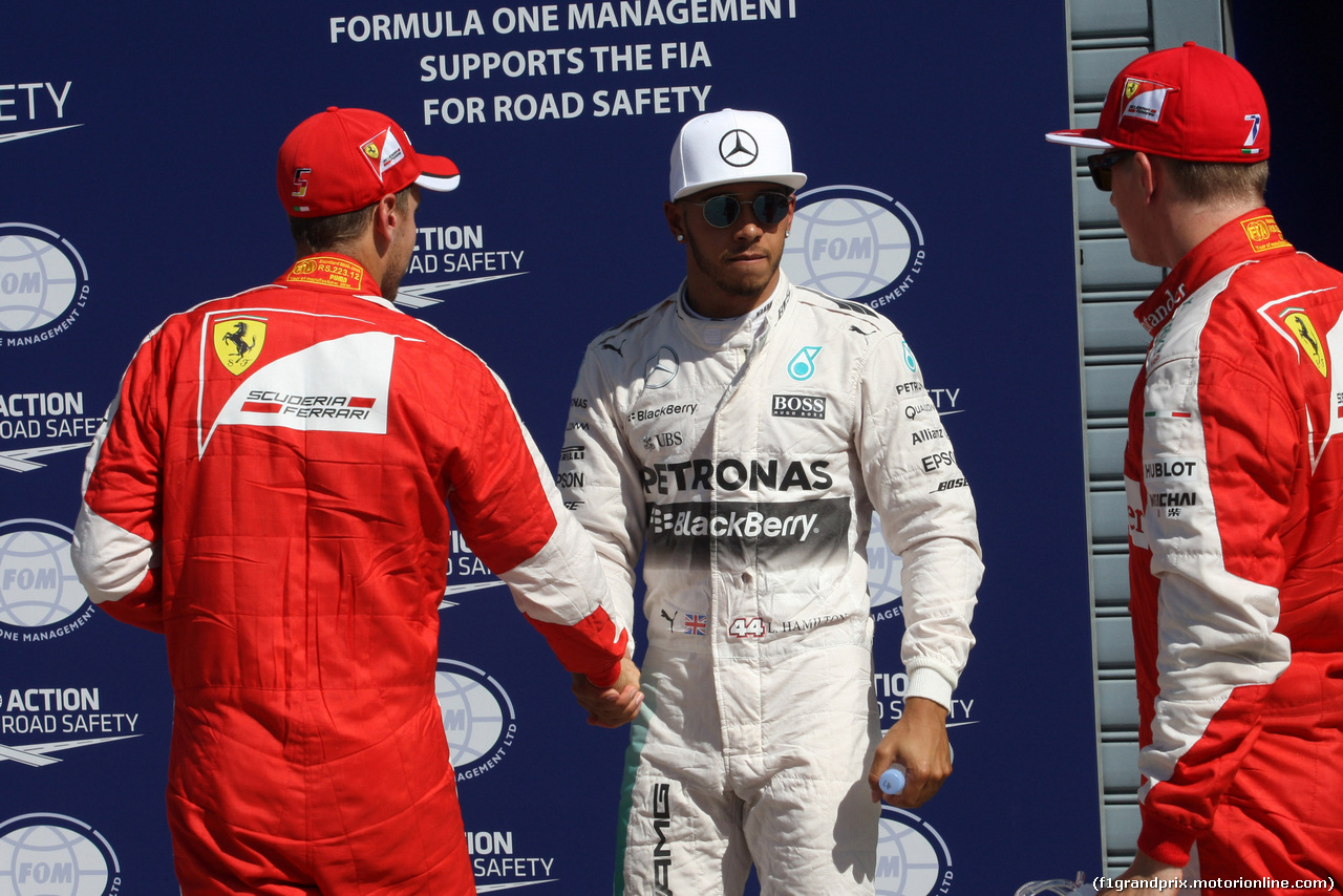 GP ITALIA, 05.09.2015 - Qualifiche, Sebastian Vettel (GER) Red Bull Racing RB10 e Lewis Hamilton (GBR) Mercedes AMG F1 W05 pole position with Kimi Raikkonen (FIN) Ferrari F14-T