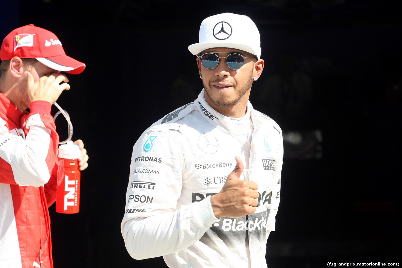 GP ITALIA, 05.09.2015 - Qualifiche, Sebastian Vettel (GER) Red Bull Racing RB10 e Lewis Hamilton (GBR) Mercedes AMG F1 W05 pole position