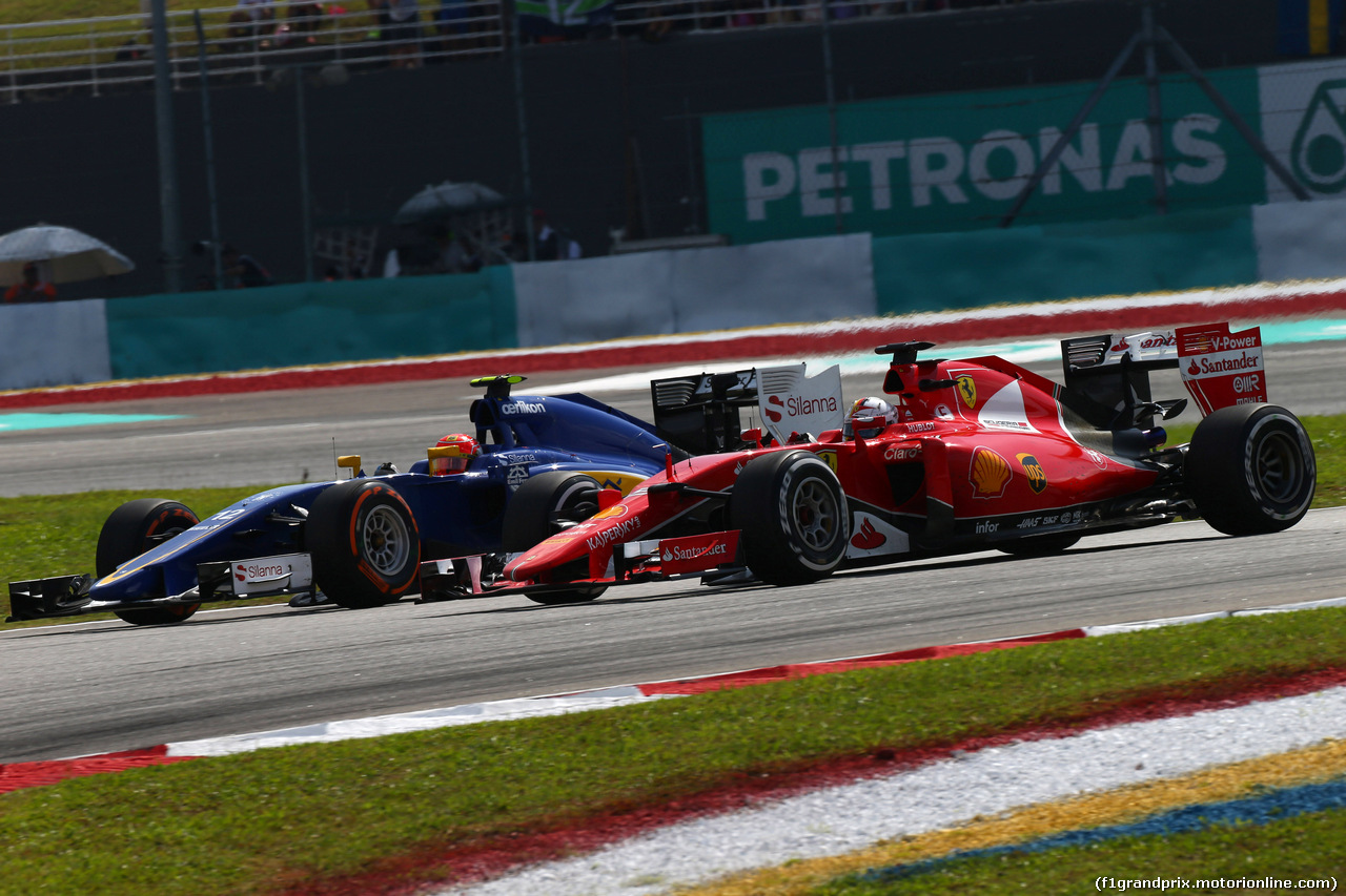 GP MALESIA, 29.03.2015- Gara, Felipe Nasr (BRA) Sauber C34 e Kimi Raikkonen (FIN) Ferrari SF15-T