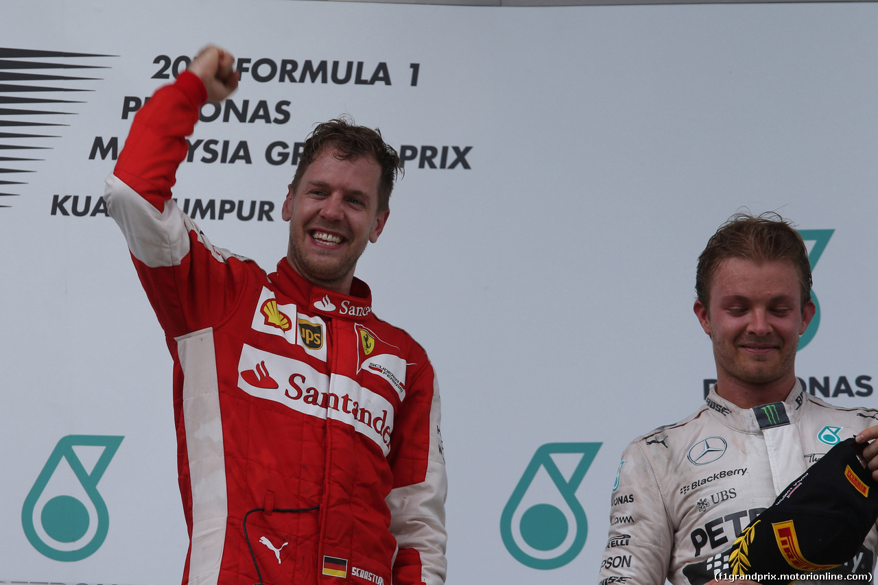 GP MALESIA, 29.03.2015- Gara, 1st position Sebastian Vettel (GER) Ferrari SF15-T e terzo Nico Rosberg (GER) Mercedes AMG F1 W06