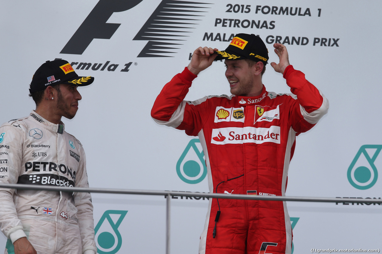 GP MALESIA, 29.03.2015- Gara, 1st position Sebastian Vettel (GER) Ferrari SF15-T e secondo Lewis Hamilton (GBR) Mercedes AMG F1 W06