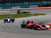 MALAYSIA GP, 29.03.2015- Race, Sebastian Vettel (GER) Ferrari SF15-T ahead of Nico Rosberg (GER) Mercedes AMG F1 W06