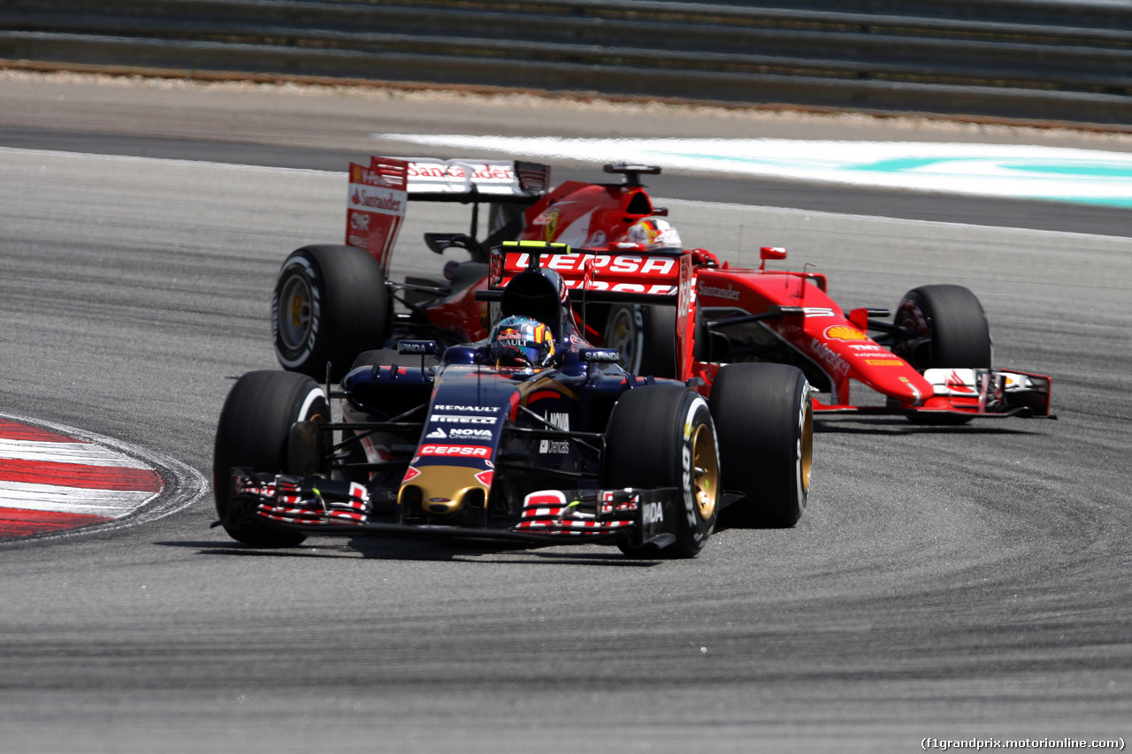 GP MALESIA, 28.03.2015 - Prove Libere 3, Carlos Sainz Jr (ESP) Scuderia Toro Rosso STR10 e Kimi Raikkonen (FIN) Ferrari SF15-T
