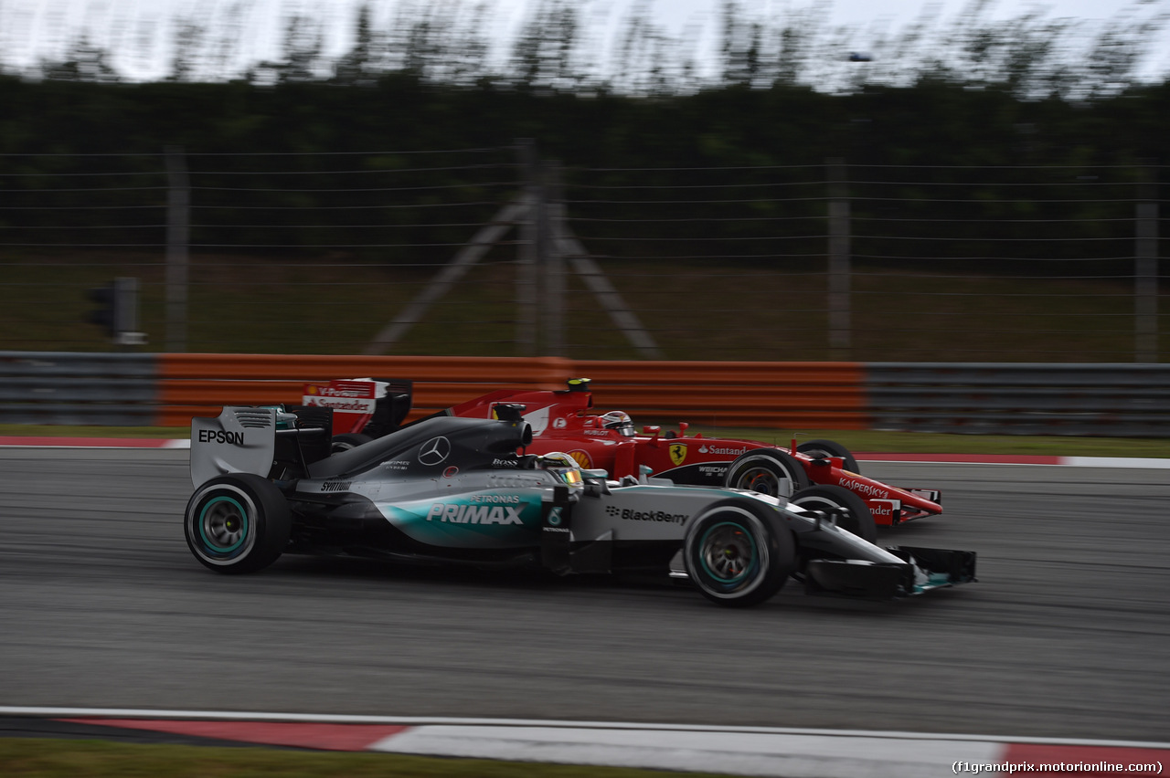 GP MALESIA, 28.03.2015 - Qualifiche, Lewis Hamilton (GBR) Mercedes AMG F1 W06 e Kimi Raikkonen (FIN) Ferrari SF15-T
