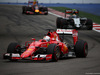 GP RUSSIA, 11.10.2015 - Gara, Sebastian Vettel (GER) Ferrari SF15-T davanti a Sergio Perez (MEX) Sahara Force India F1 VJM08