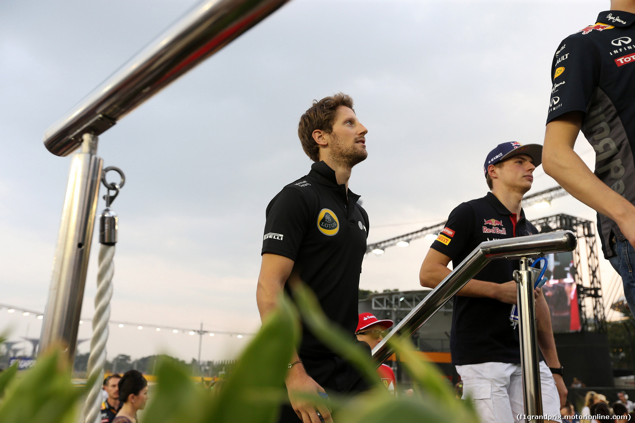 GP SINGAPORE, 20.09.2015 - Romain Grosjean (FRA) Lotus F1 Team E23 e Max Verstappen (NED) Scuderia Toro Rosso STR10