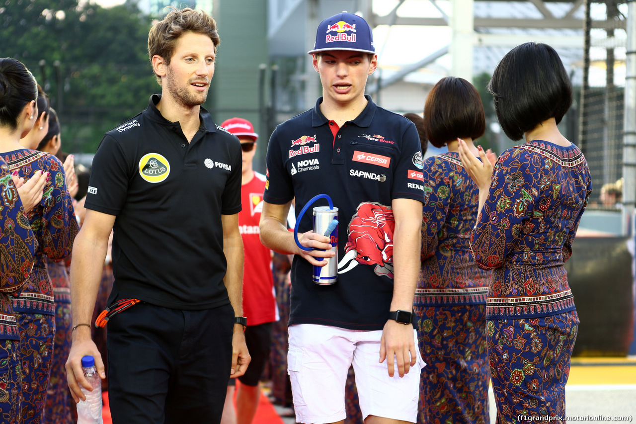 GP SINGAPORE, 20.09.2015 - Romain Grosjean (FRA) Lotus F1 Team E23 e Max Verstappen (NED) Scuderia Toro Rosso STR10