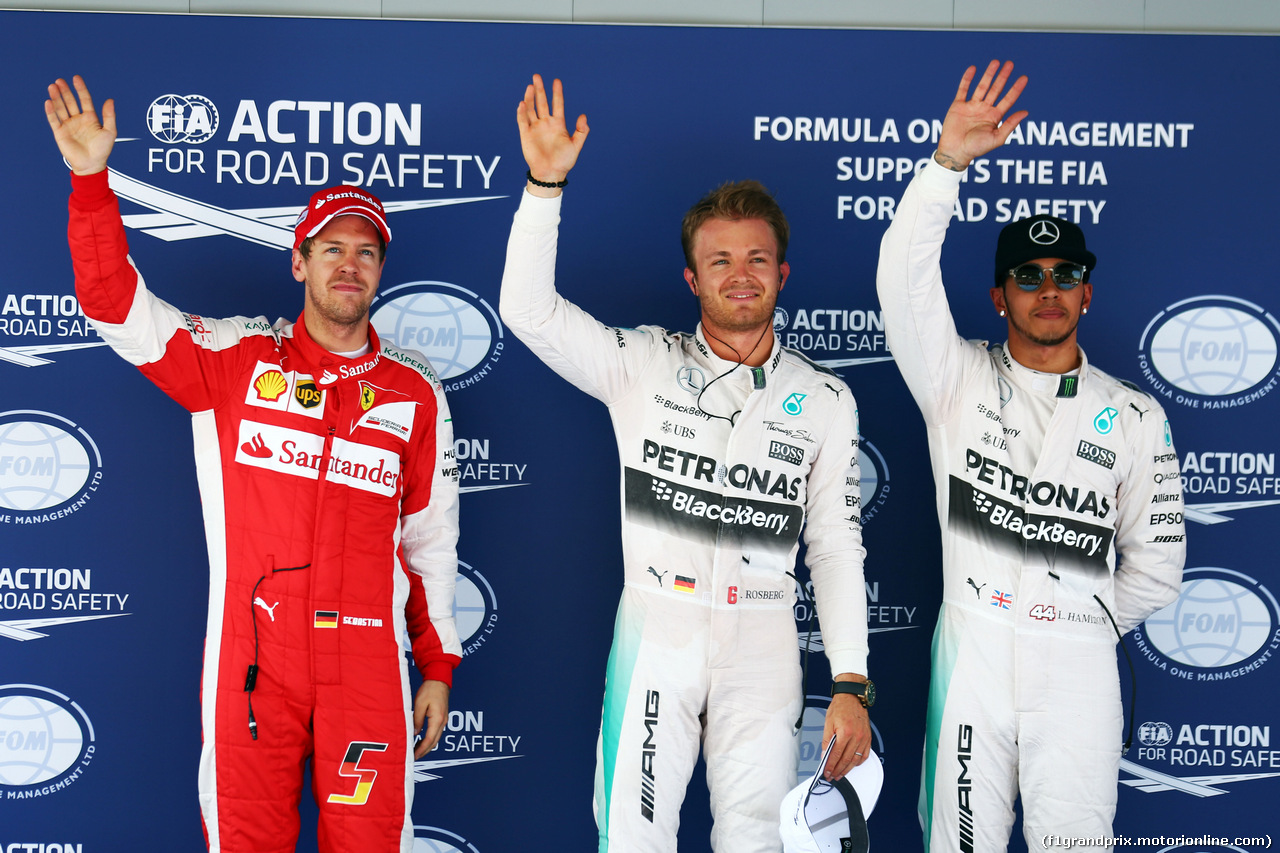 GP SPAGNA, 09.05.2015 - Qualifiche, top three in parc ferme (L to R): Sebastian Vettel (GER) Ferrari, third; Nico Rosberg (GER) Mercedes AMG F1, pole position; Lewis Hamilton (GBR) Mercedes AMG F1, second.