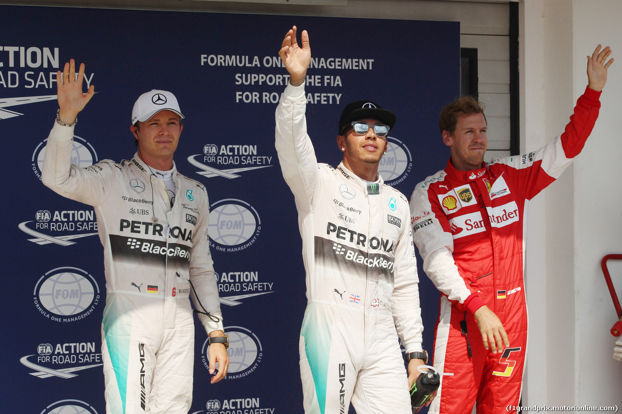 GP UNGHERIA, 25.07.2015 - Qualifiche, 1st position Lewis Hamilton (GBR) Mercedes AMG F1 W06, secondo Nico Rosberg (GER) Mercedes AMG F1 W06 e terzo Sebastian Vettel (GER) Ferrari SF15-T