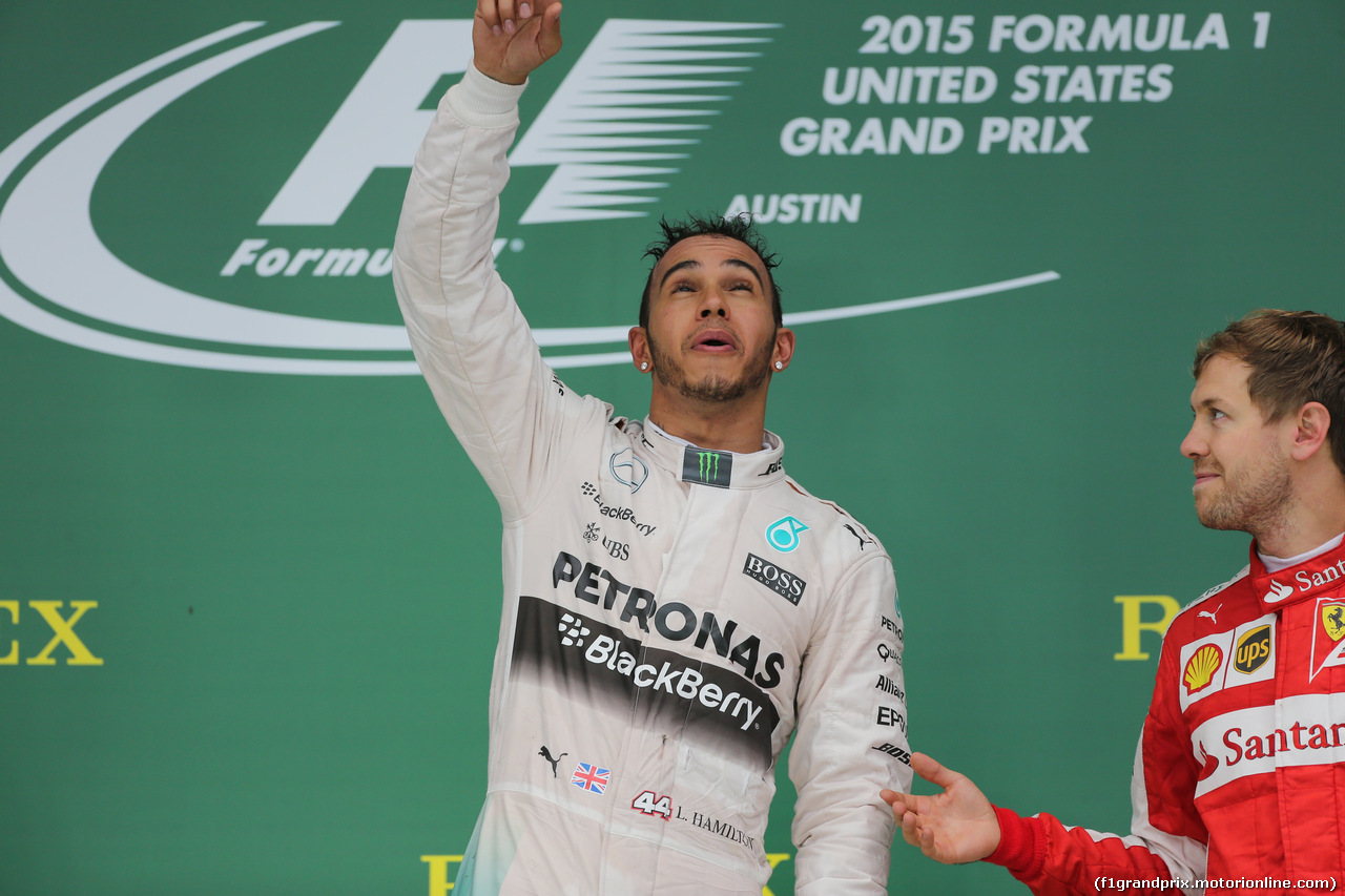 GP USA, 25.10.2015- Podium,  winner e 2015 F1 world champion Lewis Hamilton (GBR) Mercedes AMG F1 W06  with 3rd Sebastian Vettel (GER) Ferrari SF15-T