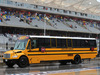 GP USA, 24.10.2015- the marshalls leave the track on  a school bus after the decision of stop track activity for today