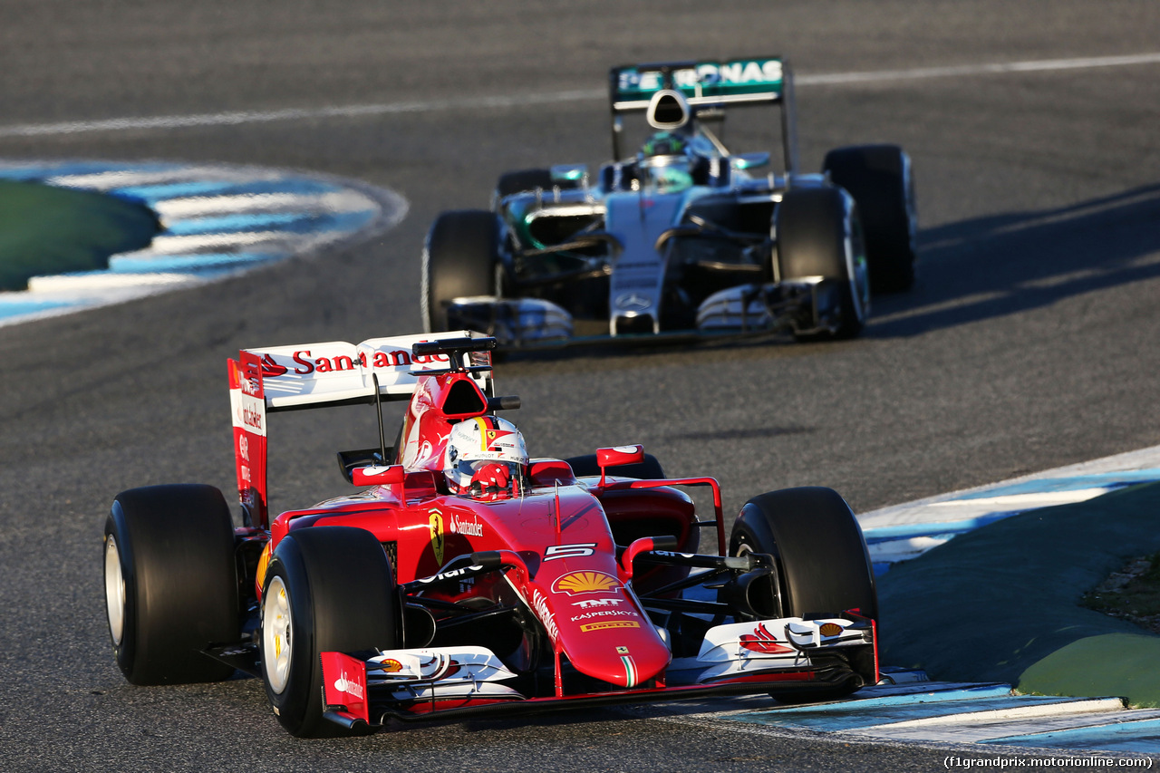 TEST F1 JEREZ 1 FEBBRAIO, Sebastian Vettel (GER) Ferrari SF15-T davanti a Nico Rosberg (GER) Mercedes AMG F1 W06.
01.02.2015.