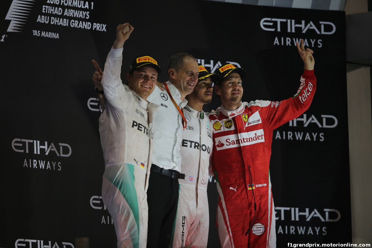 GP ABU DHABI, 27.11.2016 - Gara, 2nd place Nico Rosberg (GER) Mercedes AMG F1 W07 Hybrid e Champion 2016, Lewis Hamilton (GBR) Mercedes AMG F1 W07 Hybrid vincitore e 3rd place Sebastian Vettel (GER) Ferrari SF16-H