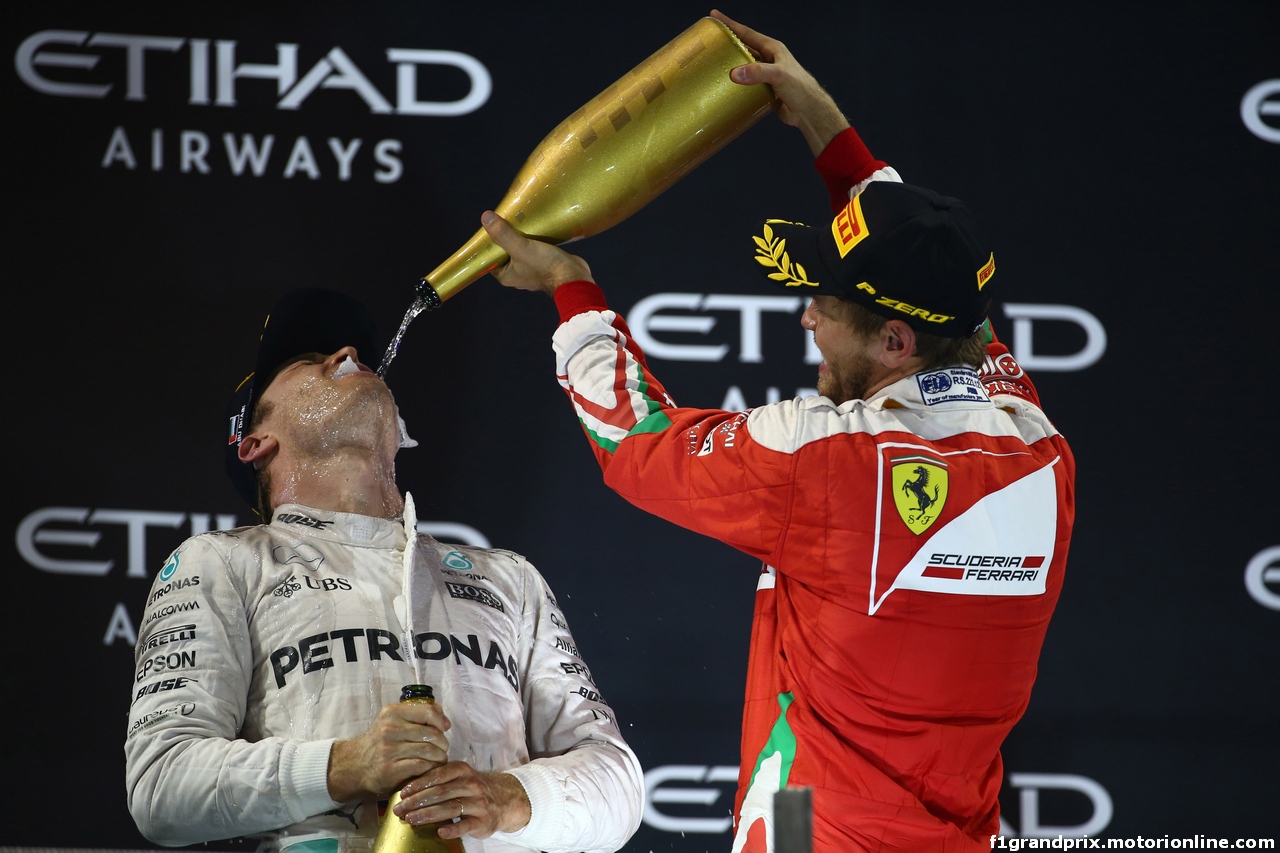GP ABU DHABI, 27.11.2016 - Gara, 2nd place Nico Rosberg (GER) Mercedes AMG F1 W07 Hybrid e Champion 2016 e 3rd place Sebastian Vettel (GER) Ferrari SF16-H
