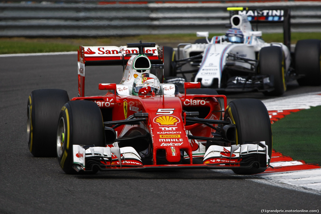 GP BELGIO, 28.08.2016 - Gara, Sebastian Vettel (GER) Ferrari SF16-H e Valtteri Bottas (FIN) Williams FW38