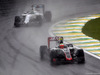 GP BRASILE, 13.11.2016 - Gara, Esteban Gutierrez (MEX) Haas F1 Team VF-16 davanti a Felipe Massa (BRA) Williams FW38