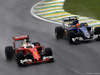 GP BRASILE, 13.11.2016 - Gara, Sebastian Vettel (GER) Ferrari SF16-H e Felipe Nasr (BRA) Sauber C34