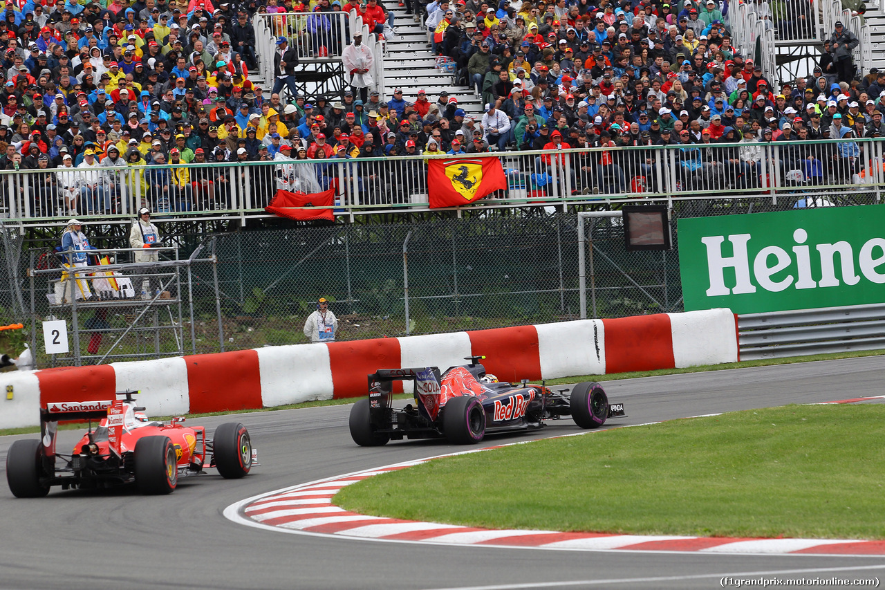 GP CANADA, 12.06.2016 - Gara, Kimi Raikkonen (FIN) Ferrari SF16-H e Carlos Sainz Jr (ESP) Scuderia Toro Rosso STR11