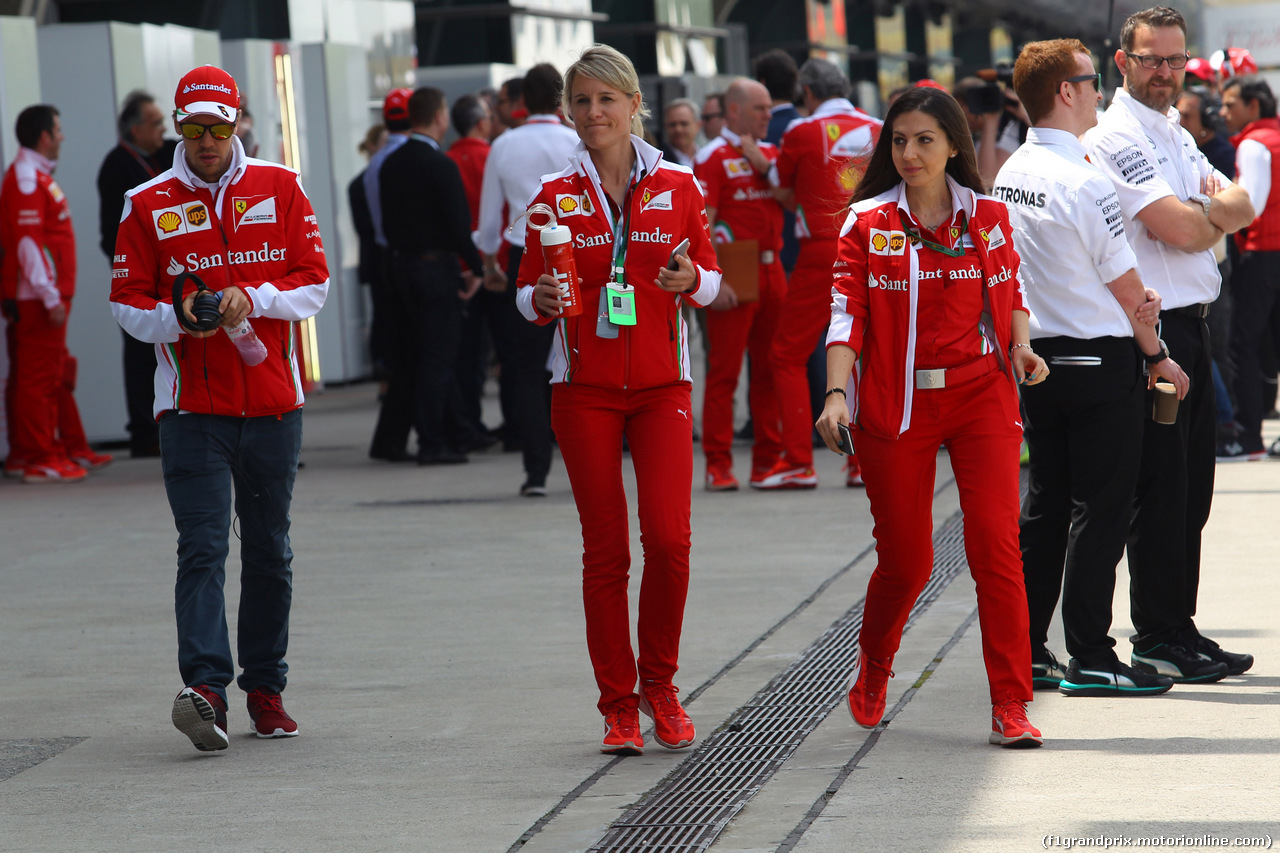 GP CINA, 17.04.2016 - Sebastian Vettel (GER) Ferrari SF16-H e Britta Roeske (AUT) Ferrari Press Officer.