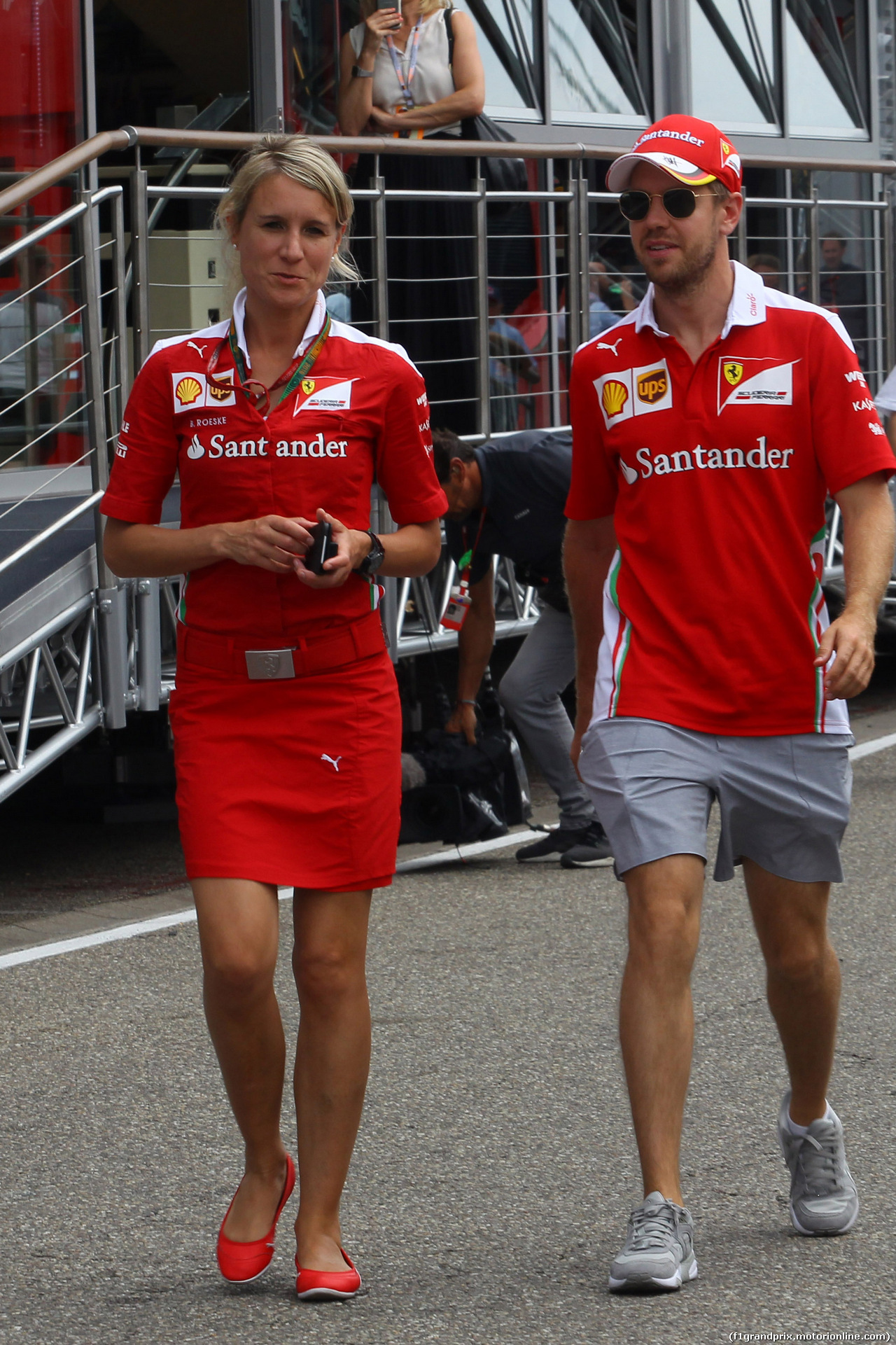 GP GERMANIA, 28.07.2016 - Britta Roeske (AUT) Ferrari Press Officer. e Sebastian Vettel (GER) Ferrari SF16-H