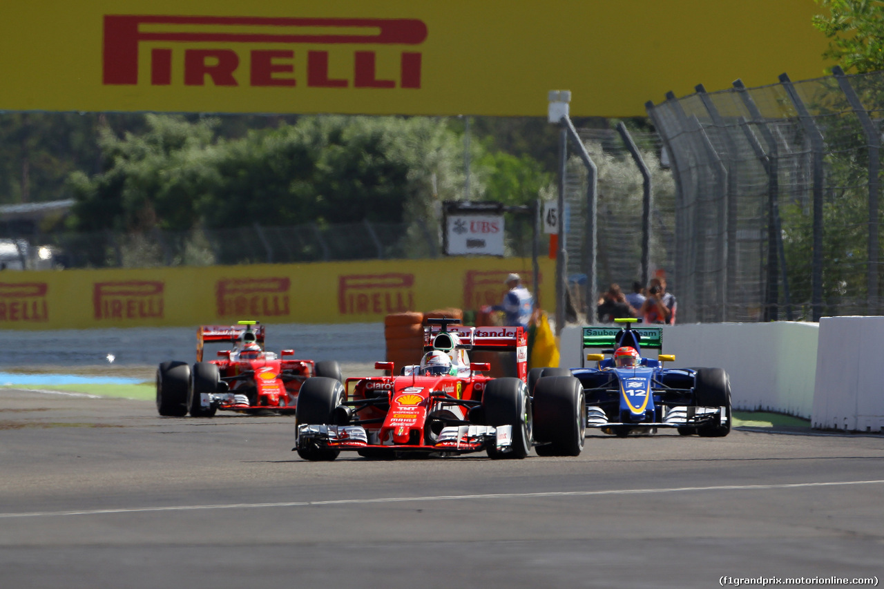 GP GERMANIA, 30.07.2016 - Prove Libere 3, Sebastian Vettel (GER) Ferrari SF16-H e Felipe Nasr (BRA) Sauber C34