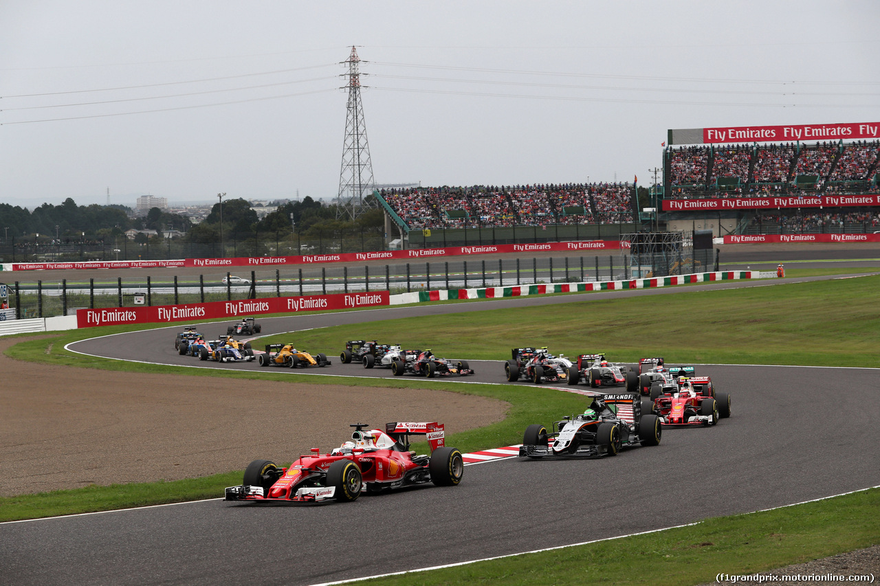 GP GIAPPONE, 09.10.2016 - Gara, Sebastian Vettel (GER) Ferrari SF16-H davanti a Nico Hulkenberg (GER) Sahara Force India F1 VJM09