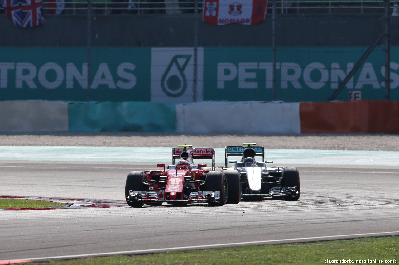 GP MALESIA, 02.10.2016 - Gara, Kimi Raikkonen (FIN) Ferrari SF16-H e Nico Rosberg (GER) Mercedes AMG F1 W07 Hybrid