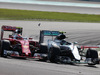 GP MALESIA, 02.10.2016 - Gara, Kimi Raikkonen (FIN) Ferrari SF16-H e Nico Rosberg (GER) Mercedes AMG F1 W07 Hybrid