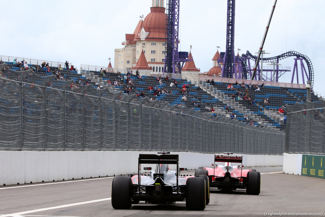 GP RUSSIA, 29.04.2016 - Prove Libere 1, Jenson Button (GBR)  McLaren Honda MP4-31 e Sebastian Vettel (GER) Ferrari SF16-H