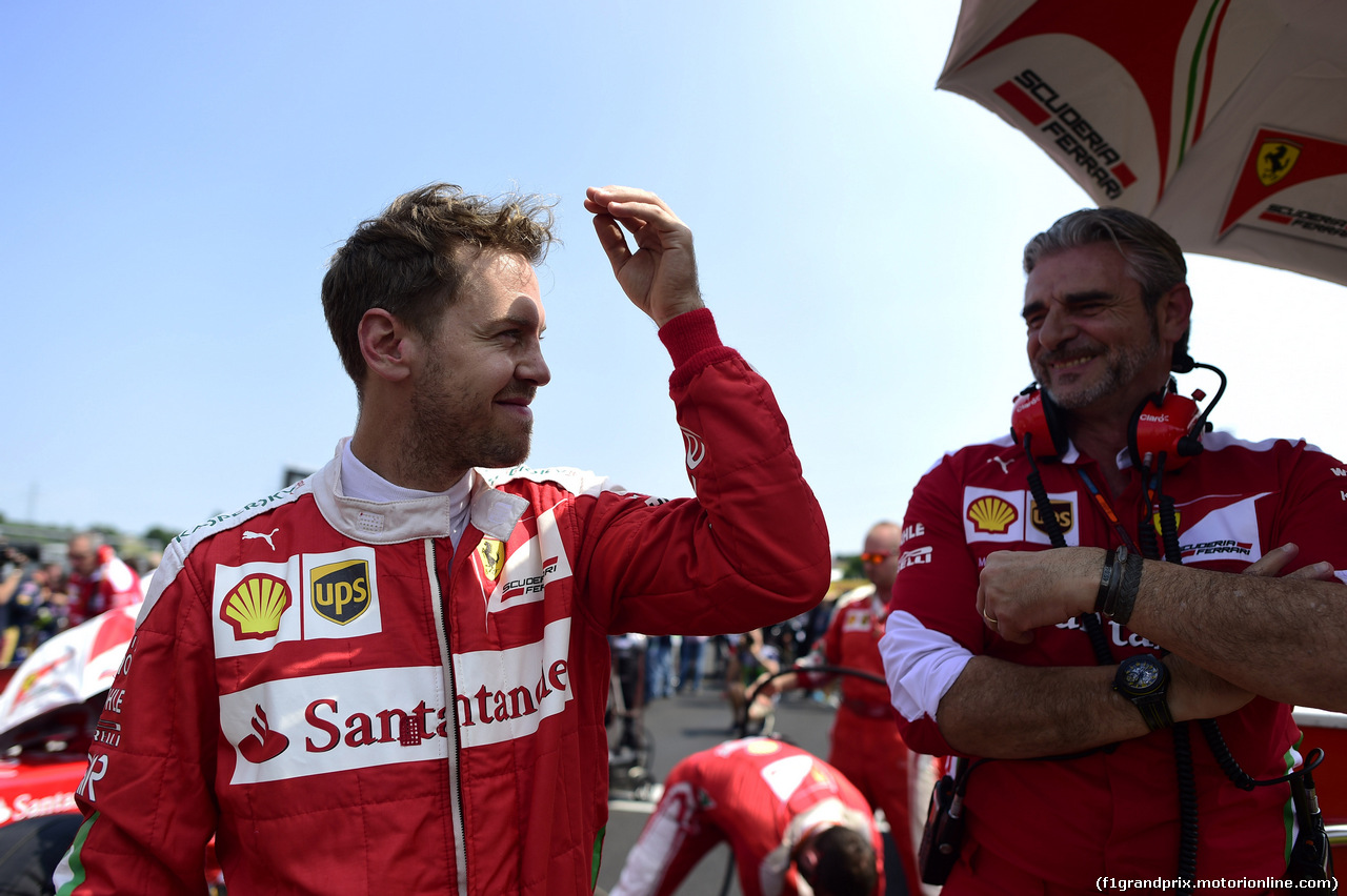 GP UNGHERIA, 24.07.2016 - Gara, Sebastian Vettel (GER) Ferrari SF16-H e Maurizio Arrivabene (ITA) Ferrari Team Principal