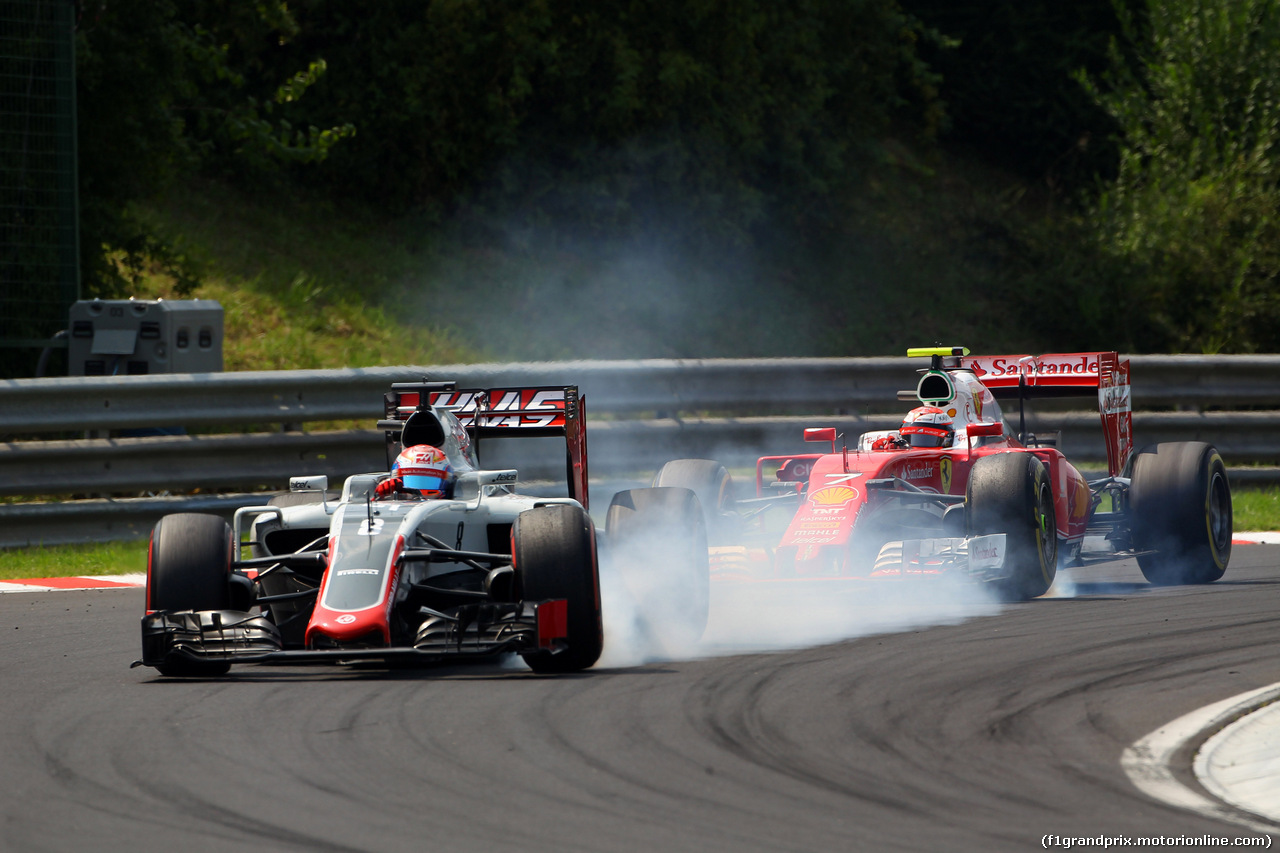 GP UNGHERIA, 24.07.2016 - Gara, Romain Grosjean (FRA) Haas F1 Team VF-16 e Kimi Raikkonen (FIN) Ferrari SF16-H