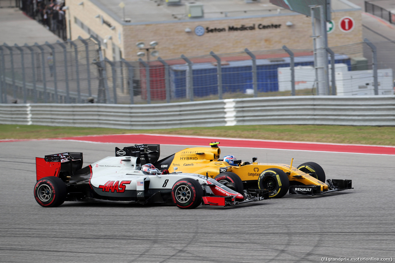 GP USA, 23.10.2016 - Gara, Romain Grosjean (FRA) Haas F1 Team VF-16 e Jolyon Palmer (GBR) Renault Sport F1 Team RS16