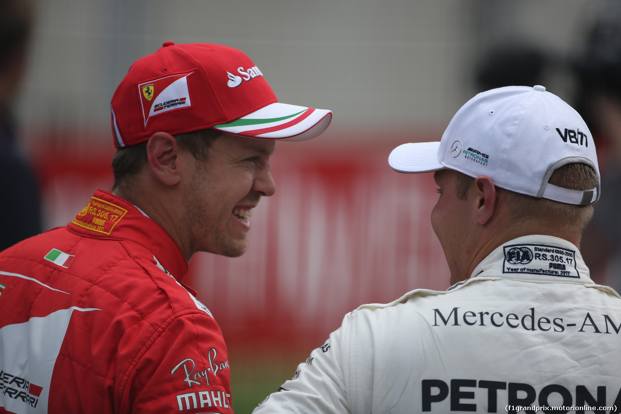 GP AUSTRIA, 08.07.2017- Sebastian Vettel (GER) Ferrari SF70H e Valtteri Bottas (FIN) Mercedes AMG F1 W08