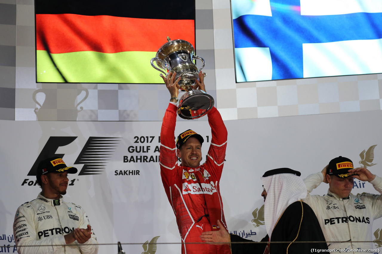 GP BAHRAIN, 16.04.2017 - Gara, 1st place Sebastian Vettel (GER) Ferrari SF70H, 2nd place Lewis Hamilton (GBR) Mercedes AMG F1 W08 e 3rd place Valtteri Bottas (FIN) Mercedes AMG F1 W08